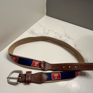 Dark blue belt with a red and white palmetto tree flag.
